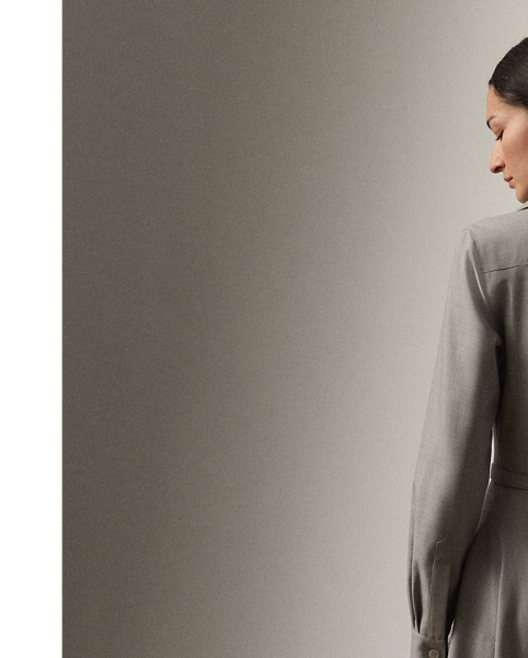 The shirtdress – one of  Ralph Lauren Lauren's signature silhouettes – is revamped this season in the Safford. Crafted in Italy from extra-fine worsted wool selected especially for its brushed, lofty finish and remarkable drape, this calf-grazing day dress is designed with princess seams, curved skirt seams and side on-seam pockets. A buckled self-belt with a petite square-shaped buckle cinches the waist for a defined figure.