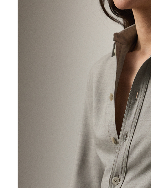 The shirtdress – one of  Ralph Lauren Lauren's signature silhouettes – is revamped this season in the Safford. Crafted in Italy from extra-fine worsted wool selected especially for its brushed, lofty finish and remarkable drape, this calf-grazing day dress is designed with princess seams, curved skirt seams and side on-seam pockets. A buckled self-belt with a petite square-shaped buckle cinches the waist for a defined figure.