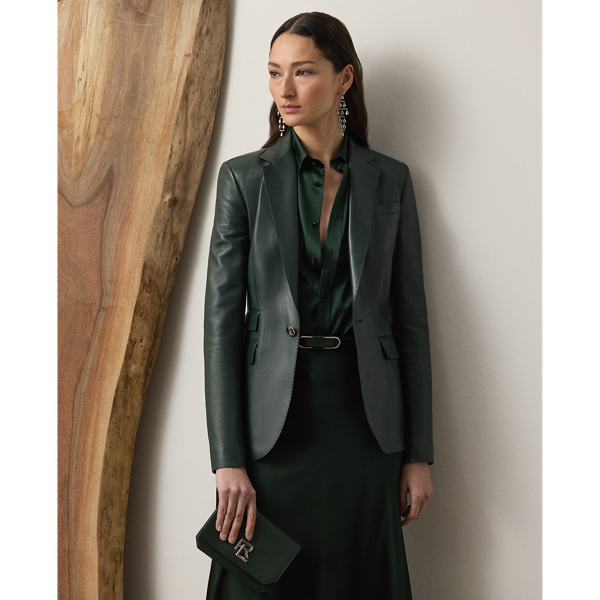 Equestrian-style hacking pockets and "RL"-and-crown-engraved buttons accent this season's version of the Parker jacket, which is crafted with supple lambskin in the season's dark racing green hue – a colour directly inspired by one of the vehicles in Mr Lauren's personal car collection. Traditional men's tailoring techniques create its slim, waist-defining silhouette.