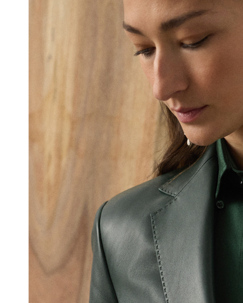 Equestrian-style hacking pockets and "RL"-and-crown-engraved buttons accent this season's version of the Parker jacket, which is crafted with supple lambskin in the season's dark racing green hue – a colour directly inspired by one of the vehicles in Mr Lauren's personal car collection. Traditional men's tailoring techniques create its slim, waist-defining silhouette.