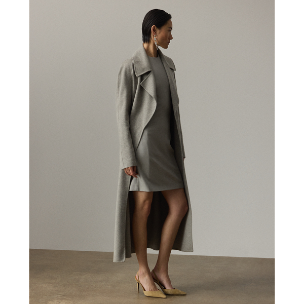 A refreshed rendition of a Ralph Lauren Lauren icon, the Kacey wrap coat updates our classic Leonarda with a longer calf-grazing length. This version is crafted from luxurious double-faced cashmere yarn-dyed in a mélange colouring and features an elegant drape and a compact yet plush hand feel. This softly constructed, Italian-made style is designed with a waist-accentuating self-belt and side on-seam pockets.