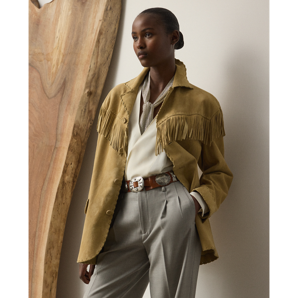 Distinguished by its relaxed, comfortable fit, the Ryland jacket is crafted with sumptuous lamb suede that's tumbled for a vintage, worn-in look. Showcasing Mr Lauren's commitment to fine Italian crafting, this jacket is detailed by hand with whipstitching and fringe trim for a Western-inspired finish.