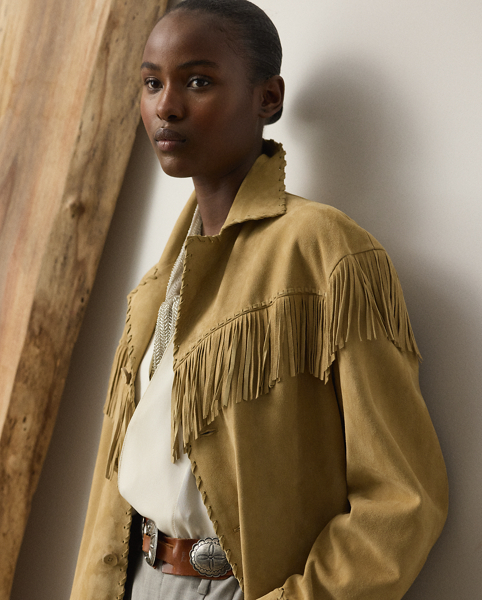 Distinguished by its relaxed, comfortable fit, the Ryland jacket is crafted with sumptuous lamb suede that's tumbled for a vintage, worn-in look. Showcasing Mr Lauren's commitment to fine Italian crafting, this jacket is detailed by hand with whipstitching and fringe trim for a Western-inspired finish.