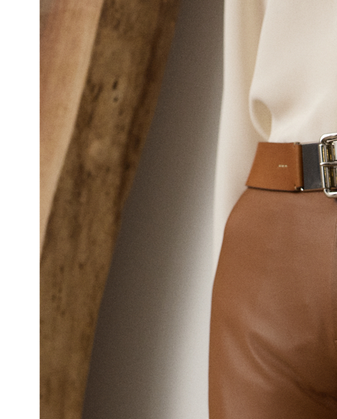 Blending refined luxury with effortless style, Pre-Autumn 2025 celebrates Mr Lauren's commitment to timeless elegance through artisanal designs, sophisticated neutrals and surprising silhouettes, which is evident in the season's Benjamen trouser. Crafted from supple nappa lambskin, this low-rise trouser is cut for a slim, tapered fit. Side on-seam pockets and back waist besom pockets enhance its sleek figure.