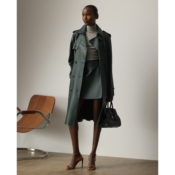 The Italian-made Niles – realised here using traditional trench coat details, including buttoned shoulder epaulets, storm flaps, a belted collar and waist and a double-breasted silhouette – is made with supple nappa lambskin that's specially dyed to the season's dark racing green hue – a colour directly inspired by one of Mr Lauren's iconic vehicles. Imitation horn buttons, lambskin-covered buckles and a debossed logo on the undercollar add refinement to its timeless design.