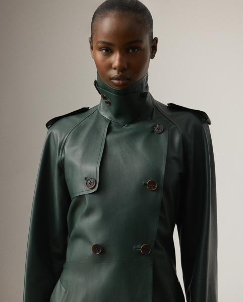 The Italian-made Niles – realised here using traditional trench coat details, including buttoned shoulder epaulets, storm flaps, a belted collar and waist and a double-breasted silhouette – is made with supple nappa lambskin that's specially dyed to the season's dark racing green hue – a colour directly inspired by one of Mr Lauren's iconic vehicles. Imitation horn buttons, lambskin-covered buckles and a debossed logo on the undercollar add refinement to its timeless design.