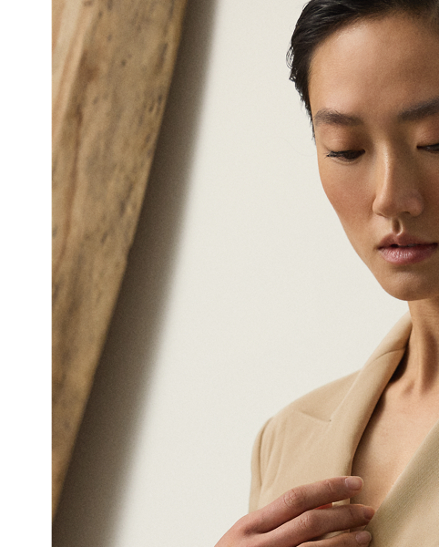 Modelled on our iconic Camden jacket, the blazer-inspired design of this day dress is elongated to create a chic mini silhouette. Staying true to  Ralph Lauren Lauren's signature tailoring methods, the Camden dress features peak lapels, shoulder pads, waist darts and back princess seams. This version is crafted in Italy from wool gabardine in a compact weave specially selected for its structured form and stunning drape.