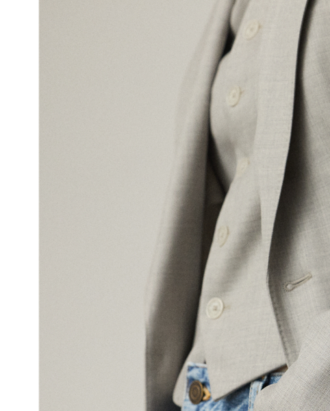 Expertly tailored with waist darts and flapped pockets, the Russel jacket's relaxed, slightly oversize fit is crafted from extra-fine worsted wool, which is specially selected for its brushed, lofty finish and remarkable drape.