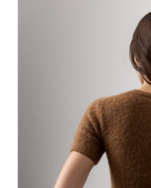 Distinguished by its cropped silhouette, this short-sleeve jumper is spun with a luxurious cashmere-and-alpaca-blend yarn, which is specially brushed to achieve a textural, remarkably soft hand feel. Rib-knit trim and a rich cognac hue complete the look.