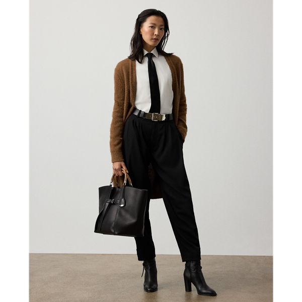 Distinguished by its knee-grazing silhouette, this oversize, long cardigan jumper is spun from a luxurious cashmere-and-alpaca-blend yarn, which is specially brushed to achieve a textural, remarkably soft hand feel. Rib-knit trim, genuine horn buttons and a rich cognac hue complete the look.