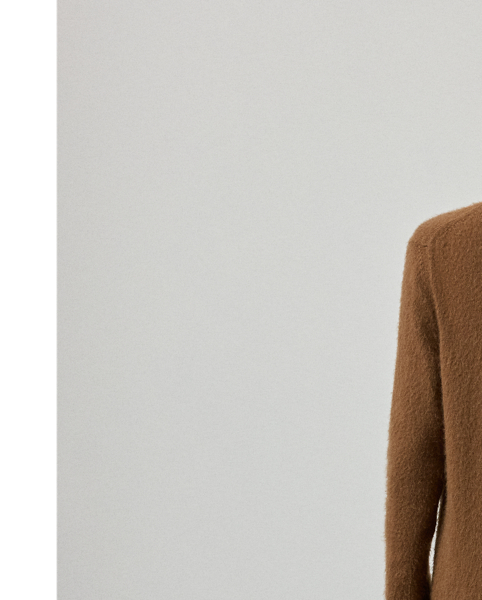 Distinguished by its knee-grazing silhouette, this oversize, long cardigan jumper is spun from a luxurious cashmere-and-alpaca-blend yarn, which is specially brushed to achieve a textural, remarkably soft hand feel. Rib-knit trim, genuine horn buttons and a rich cognac hue complete the look.