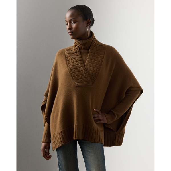 An elegant layering piece, this cape-style jumper is spun with medium-weight cashmere jersey and features a shawl collar, elbow-length sleeves and rib-knit trim.