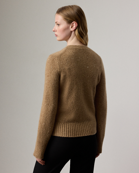 Cut for a relaxed fit, this version of Ralph Lauren Lauren's signature crewneck jumper is distinguished by a soft jersey construction, which is crafted from a beautiful slub Donegal cashmere yarn.