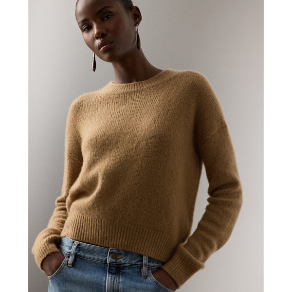  Ralph Lauren Lauren's iconic crewneck jumper is updated for the season with a relaxed fit, dropped shoulders and a mid-weight jersey construction, which is made with a luxurious blend that includes cashmere and silk.