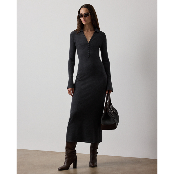 This slim-fitting style re-imagines the classic Polo shirt as a calf-grazing day dress with long sleeves. Featuring a Polo collar, bell cuffs and fabric-covered buttons, this dress is knit with lightweight interlock jersey – a fabrication created with 100% virgin wool and esteemed for its unique balance of structure, softness and fluidity.