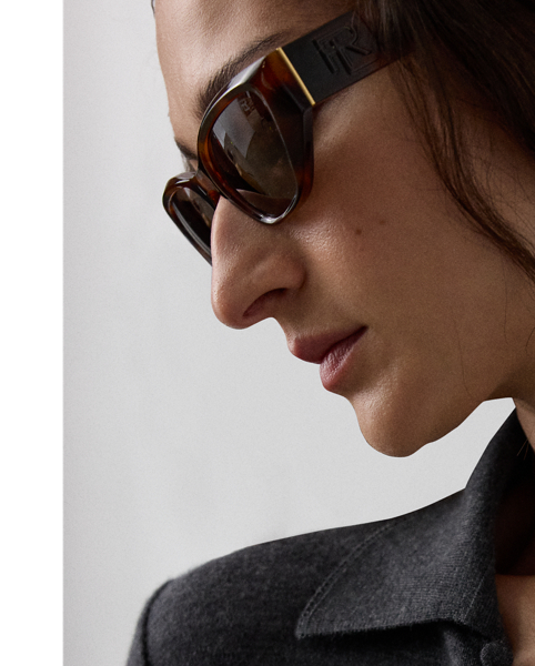 This slim-fitting style re-imagines the classic Polo shirt as a calf-grazing day dress with long sleeves. Featuring a Polo collar, bell cuffs and fabric-covered buttons, this dress is knit with lightweight interlock jersey – a fabrication created with 100% virgin wool and esteemed for its unique balance of structure, softness and fluidity.