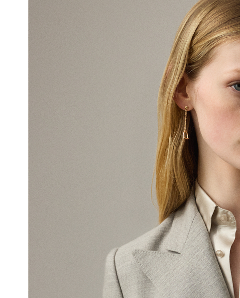 Debuted as a men's sporting style in 19th-century Britain, the double-breasted jacket is one of  Ralph Lauren Lauren's enduring silhouettes. This version of the iconic Camden is crafted from 100% broken-twill cashmere, which is yarn-dyed in the season's refined mélange colouring. Our signature polished buttons complete the look.