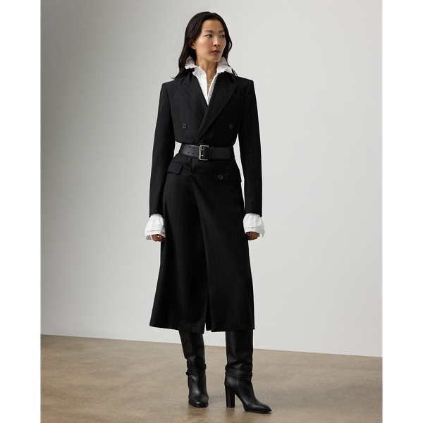 Reimagining Ralph Lauren Lauren's iconic Kent jacket as a calf-grazing day dress, the Camryn is cut for a menswear-inspired double-breasted silhouette with peak lapels. Traditionally tailored with waist darts and a vent at the back hem, this dress is rendered in our classic chalk-stripe flannel fabric, which has been carefully redeveloped to achieve an even softer hand and a lighter weight.