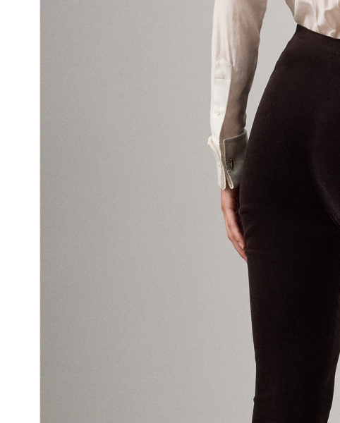 First introduced in  Ralph Lauren Lauren's 1985 Equestrian collection for women, Mr Lauren's fondness for traditional riding attire has since become a defining characteristic of the house, which is evident in the season's Ryann trouser. Merging the sleek fit of a legging with lightweight stretch velvet for a remarkable drape, the Ryann is designed with an elastic stirrup detail at the hems for secure wear. Unzip its vented cuffs to highlight your shoes, or wear them closed to accentuate its streamlined silhouette.