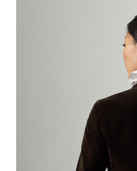 Equestrian-style hacking pockets and genuine horn buttons detail this season's version of the Parker jacket, which is crafted from lightweight stretch velvet for a remarkable drape. Traditional men's tailoring techniques ensure it maintains its slim, waist-defining silhouette for years to come.