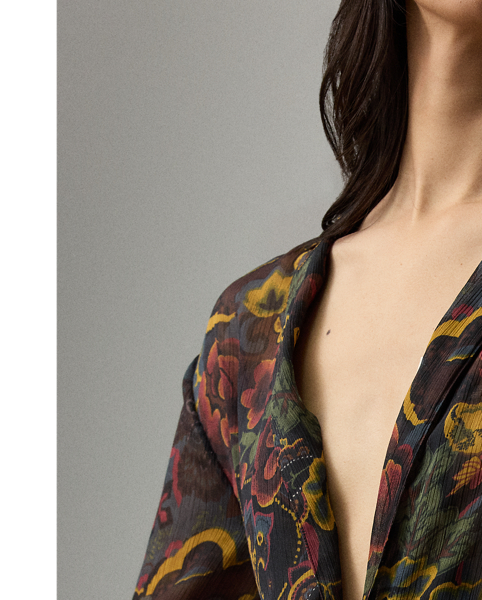 For the Autumn 2025 Collection, Mr Lauren has paired the romantic elements iconic to the Victorian era with modern silhouettes, as evident here in the Jolie blouse. Crafted in Italy from delicate crinkle chiffon, this top is printed in a renowned Como-based mill with one of the season's jewel-tone motifs – a dreamy collage of flowers and paisleys. With blouson sleeves and ruffled cuffs, this elegant style is detailed with genuine mother-of-pearl buttons and a slender camp collar.