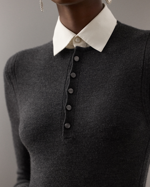 A beautiful pairing of luxurious textures, the Callie dress unites a soft wool-blend Henley top with a pleated, wool-blend flannel skirt. Equipped with a detachable woven collar and cuffs for versatile styling, this elegant day dress undergoes a fabric-manipulation technique, known as plissé soleil, to form its stunning pleated effect at the skirt. Genuine mother-of-pearl cufflinks and pointelle stitching down the side seams nod to the season's elevated aesthetic.