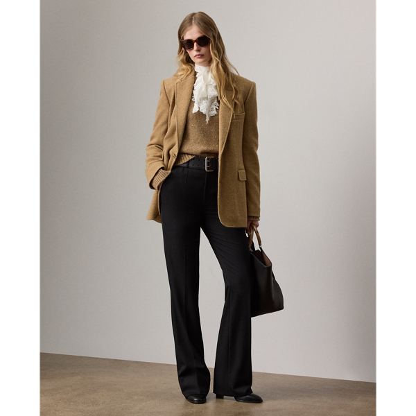 Cut for a mid-rise and a subtle bootcut silhouette, the Wrigley trouser is rendered in the season's classic grain de poudre fabric, which is woven with high-twist, ultra-fine wool yarn for a clean finish and a crisp-yet-soft hand feel. Sleek leg creases and back waist darts enhance its tailored appeal.