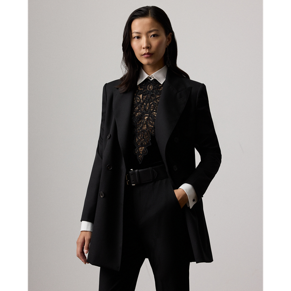 A refreshed rendition of a  Ralph Lauren Lauren icon, the Varick reimagines our signature Kent jacket with a longer, thigh-grazing length. Traditionally tailored with waist darts and shoulder pads, this double-breasted blazer is rendered in the season's classic grain de poudre fabric, which is woven with high-twist, ultrafine wool yarn that offers a clean finish and a crisp-yet-soft hand feel.