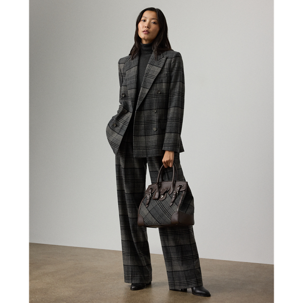 Tailored with pleats, waist darts and crisp creases down each leg, this version of the high-rise Jody trouser is crafted with the season's plaid wool fabric that is specially selected for its soft hand and light weight.