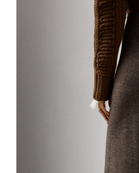 The wide-leg Isaiah trouser is distinguished by its flattering high rise, a clean waistband with back waist darts and crisp creases. Crafted in Italy, this timeless style is made with tick-weave wool jersey for a remarkable drape and soft hand feel.