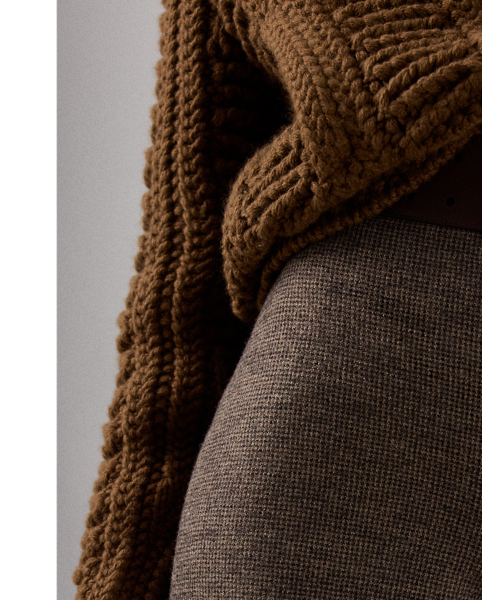 The wide-leg Isaiah trouser is distinguished by its flattering high rise, a clean waistband with back waist darts and crisp creases. Crafted in Italy, this timeless style is made with tick-weave wool jersey for a remarkable drape and soft hand feel.