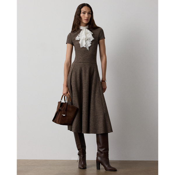 Uniting traditional tailoring elements with the appeal of soft dressing, the Margaret features engineered side panels with on-seam pockets, bust darts, a flattering crewneck and a sweeping A-line skirt. Crafted in Italy, this timeless style is made with tick-weave wool jersey for a remarkable drape and soft hand feel.