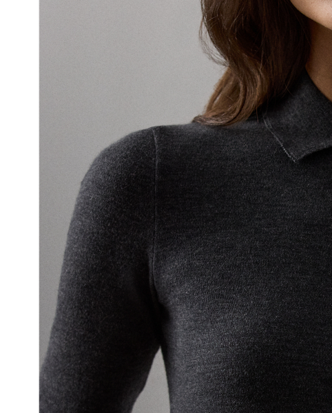 This timeless style reimagines the classic Polo shirt as a slim-fitting top with elbow-length sleeves. Featuring a rib-knit Polo collar and genuine mother-of-pearl buttons custom-developed with  Ralph Lauren Lauren's logo, this top is knit with lightweight interlock jersey – a fabrication created with 100% virgin wool and considered for its unique balance of structure, softness and fluidity.