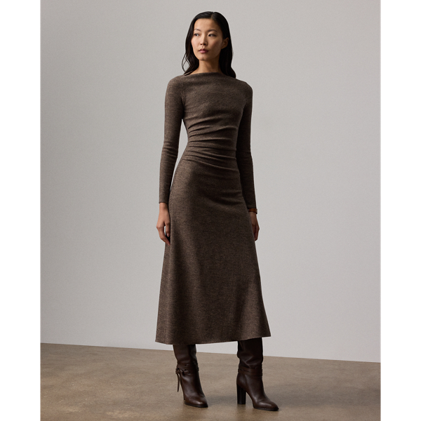 Uniting traditional tailoring elements with the appeal of soft dressing, the Nora features a flattering straight neckline, gathering at the waist and a sweeping A-line skirt. Crafted in Italy, this timeless style is made with tick-weave wool jersey for a remarkable drape and soft hand feel.