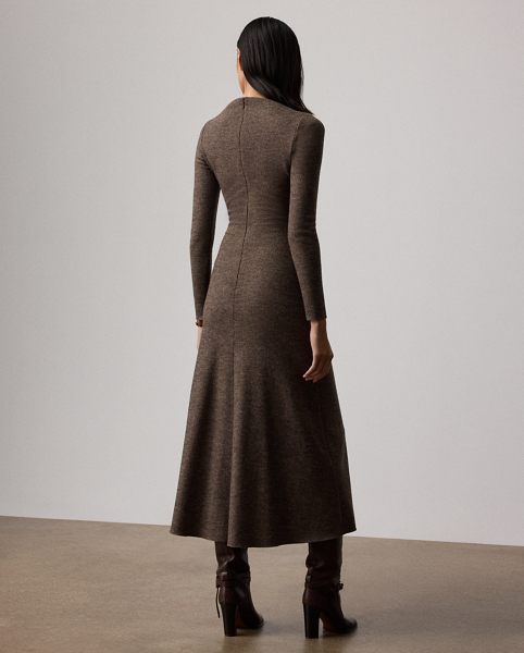 Uniting traditional tailoring elements with the appeal of soft dressing, the Nora features a flattering straight neckline, gathering at the waist and a sweeping A-line skirt. Crafted in Italy, this timeless style is made with tick-weave wool jersey for a remarkable drape and soft hand feel.