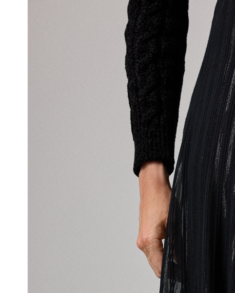 Cut for a floor-sweeping length, the Carlita skirt is crafted from airy jacquard, which is made on a silk chiffon base with contrasting wool and metallic stripes for a semi-sheer, semi-glossy effect.