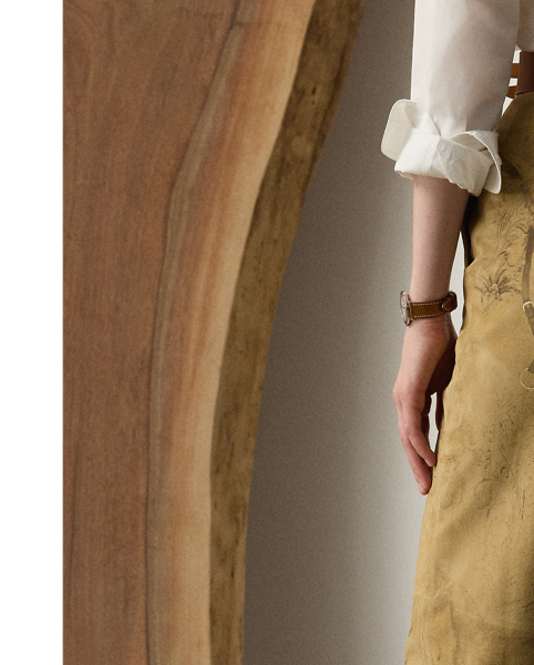 The Gillian trouser is crafted in Italy from sumptuous lamb suede, which is specially printed with one of the season's equestrian-inspired motifs – a soft, understated pattern depicting horses, riding equipment and hints of paisley. Crisp creases and genuine horn buttons adorn these timeless trousers, which are designed with buttoned tabs on the hems for a more tapered fit.