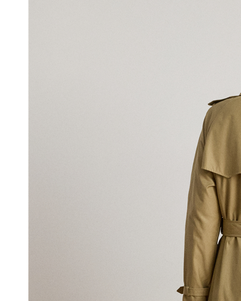 A buckled self-belt enhances the streamlined silhouette of this double-breasted trench coat, which is tailored from a lightweight cotton blend. Buttoned shoulder epaulettes and “Lauren  Ralph Lauren Lauren”-engraved horn-effect buttons amp up its sophisticated appeal, while storm flaps and a water-resistant shell protect you from inclement weather.