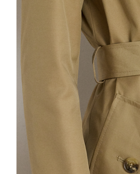 With a double-breasted silhouette, a belted waist and buttoned shoulder epaulets, this trench coat is a time-honoured wardrobe staple. “Lauren  Ralph Lauren Lauren”-engraved horn-effect buttons add signature style, while a water-resistant cotton-blend shell will keep you dry.