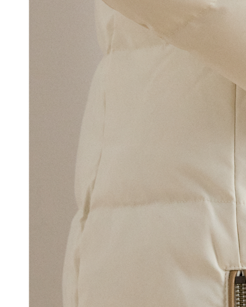 Equal parts stylish and practical, this channel-quilted coat is designed with a detachable, faux fur-trimmed hood, a water-resistant shell and cosy 450-fill-power down to keep you dry and warm. Front and back princess seams enhance this style’s streamlined silhouette, while “LRL”-engraved metal snaps add signature style.