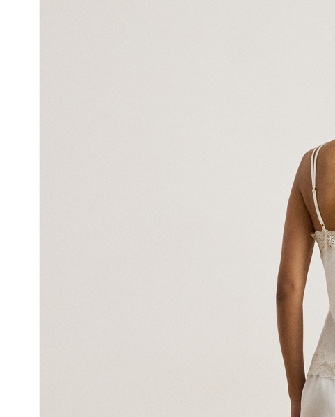 The luxuriously smooth hand of satin lends a lustrous sheen to this sleep set, which pairs airy shorts with a double-strap camisole. Delicate lace trim enhances its romantic appeal.