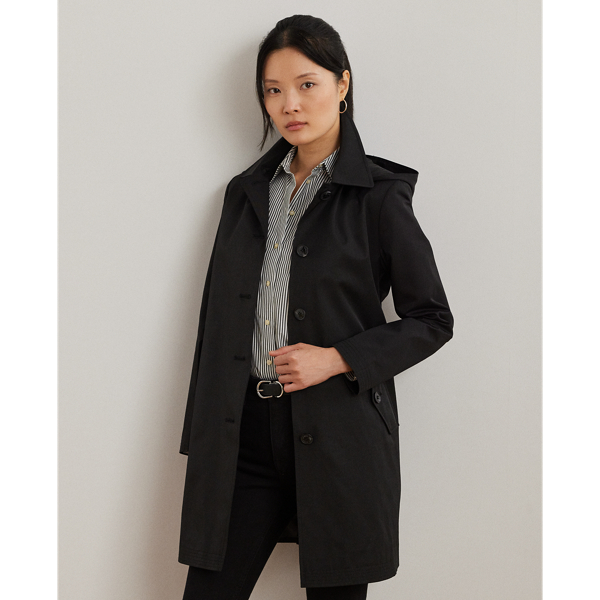 With a water-repellent cotton-blend shell and a menswear-inspired balmacaan coat silhouette, this piece seamlessly merges practical design elements with sophisticated sartorial details. A detachable hood offers versatility, while "Lauren Ralph Lauren Lauren"-engraved horn-effect buttons add a signature finish.