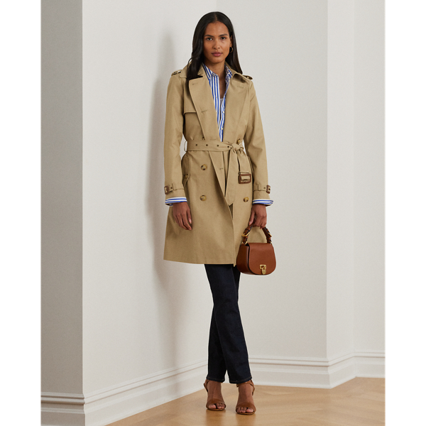 Rendered in a soft cotton blend, Lauren's take on the trench coat showcases traditional styling details, including a double-breasted silhouette and buttoned shoulder epaulets. A buckled self-belt accentuates the waist, while "Lauren  Ralph Lauren Lauren"-engraved horn-effect buttons lend a signature finish.