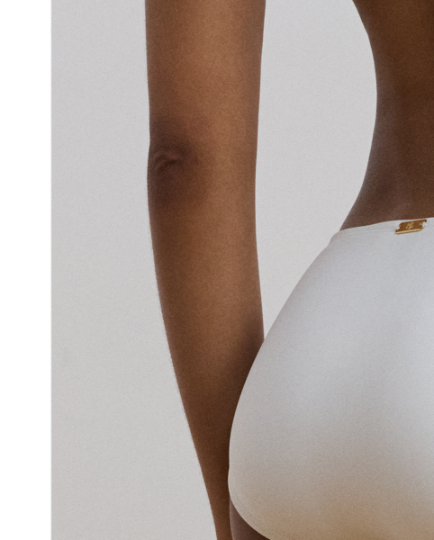 Cut to sit below your waist, this solid-hued bottom is perfect for mixing and matching with Lauren's tankini and bikini tops. An "LRL"-engraved metal plaque on the centre back gives it a sophisticated signature finish.