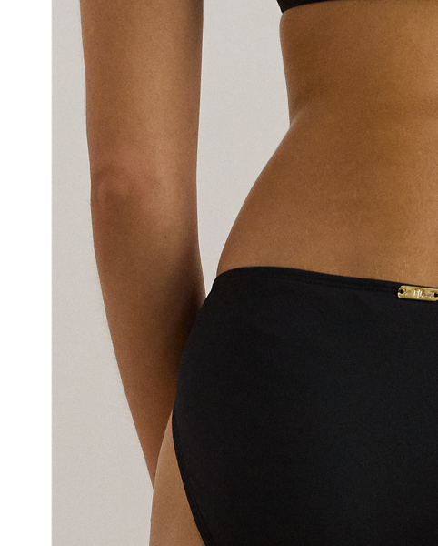 Cut to sit below the waist, this hipster bikini bottom features a macramé O-ring at the hip for an artisanal touch.