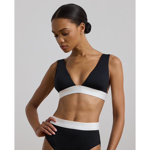 With adjustable straps to ensure the perfect fit, this bikini top is characterised by a deep V-neck and a two-tone design.