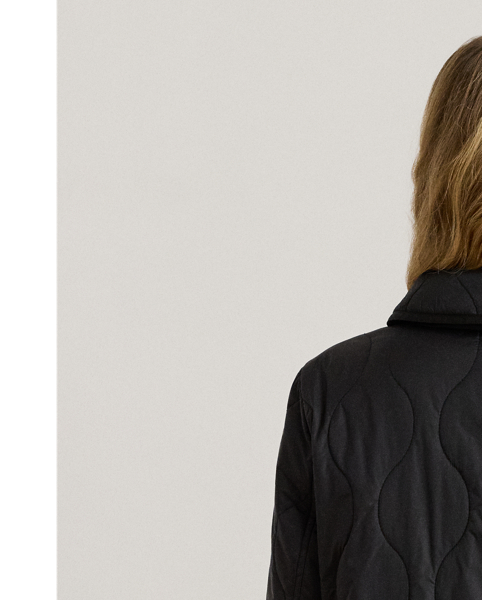 With its insulated, onion-quilted silhouette and spread collar, this jacket is both a practical and sophisticated addition to your outerwear collection. "Lauren  Ralph Lauren Lauren"-engraved horn-effect buttons complete the look.