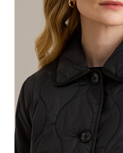 With its insulated, onion-quilted silhouette and spread collar, this jacket is both a practical and sophisticated addition to your outerwear collection. "Lauren  Ralph Lauren Lauren"-engraved horn-effect buttons complete the look.