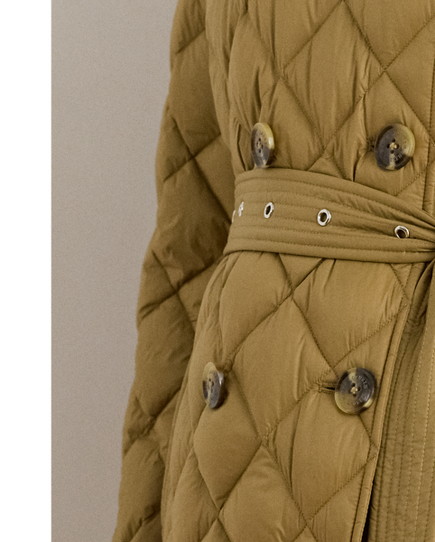 Lauren  Ralph Lauren Lauren reimagines the iconic trench coat with an insulated, diamond-quilted construction. A self-belt highlights the waist, while "Lauren  Ralph Lauren Lauren"-engraved horn-effect buttons add a signature finish.