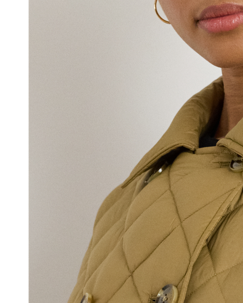 Lauren  Ralph Lauren Lauren reimagines the iconic trench coat with an insulated, diamond-quilted construction. A self-belt highlights the waist, while "Lauren  Ralph Lauren Lauren"-engraved horn-effect buttons add a signature finish.
